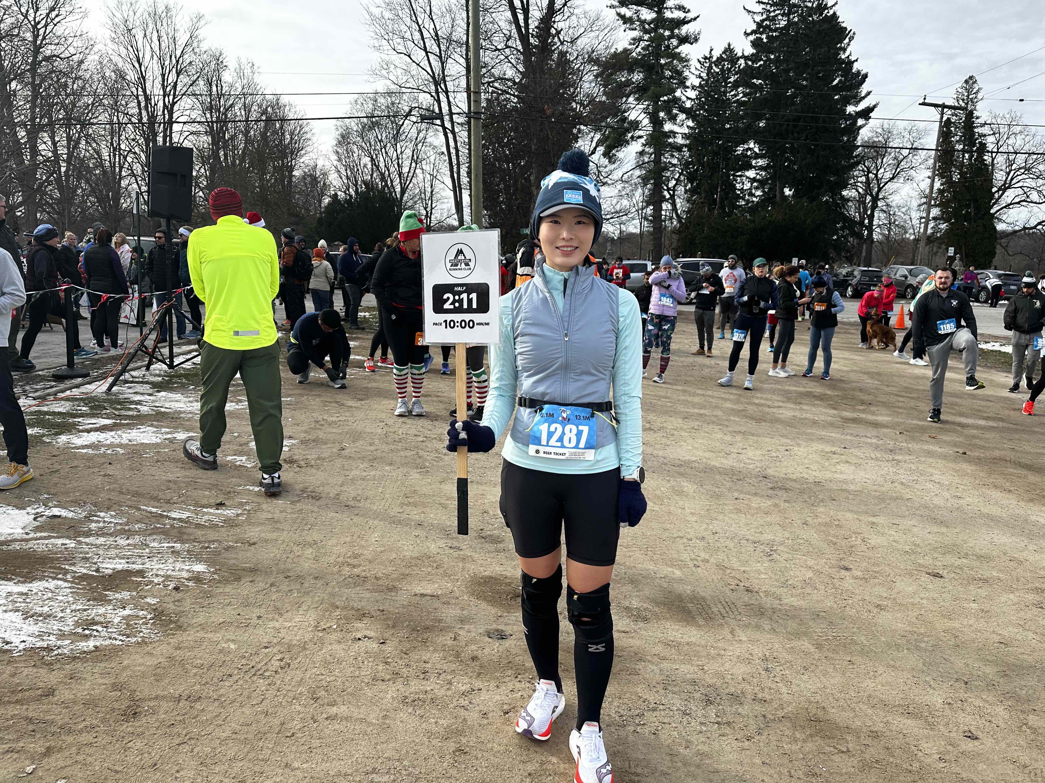 Yiqi Li pacing the Holiday Hustle Half Marathon